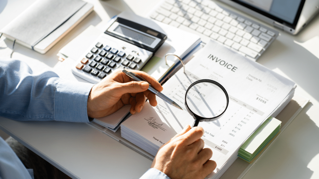 An image of a forensic accountant reviewing records to uncover fraud